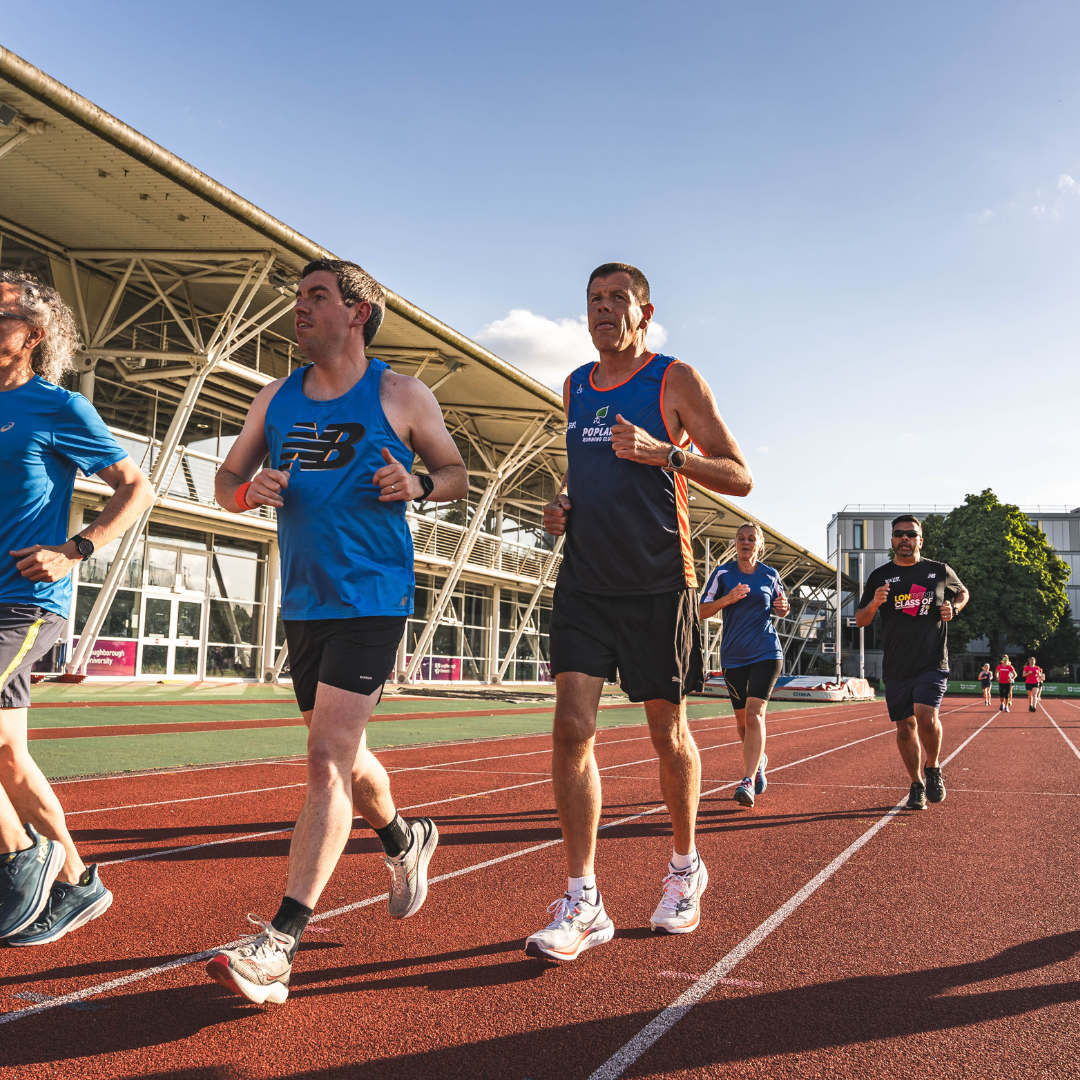 Runners on the track at a RunThrough training night
